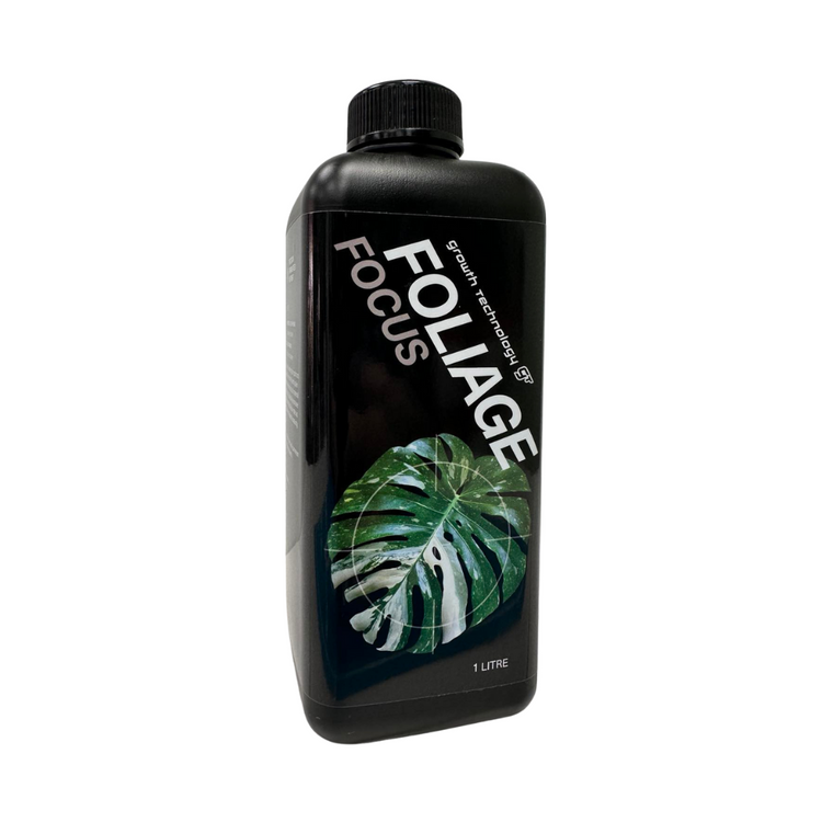 Bottle of Foliage Focus plant nutrient with a leaf graphic on a white background