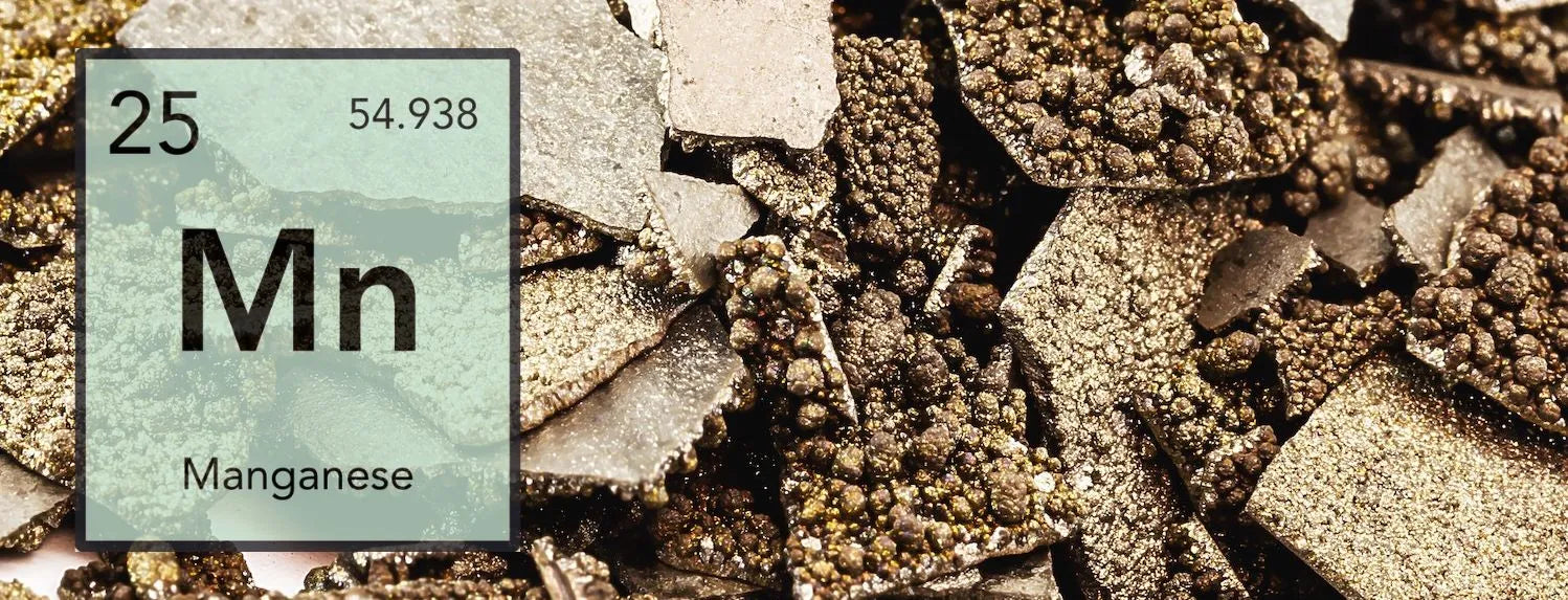 Manganese (Mn) element tile over manganese ore texture, highlighting essential hydroponic micronutrient for plant growth, germination and vegetative development in nutrient solutions.