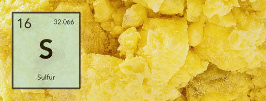 Close-up of yellow sulphur mineral with S element symbol overlay, highlighting essential hydroponic nutrient for protein synthesis, enzyme function and healthy plant growth in Australian systems