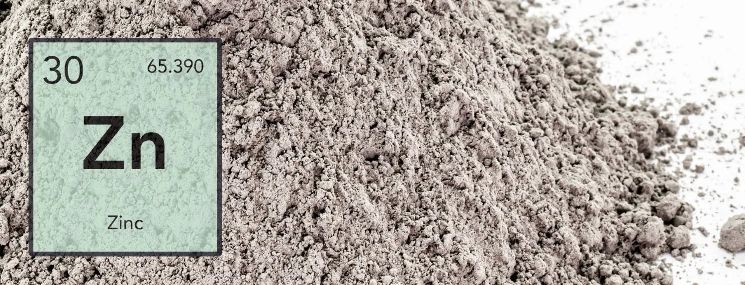 Close-up of zinc nutrient powder with Zn element symbol overlay, essential hydroponic micronutrient for enzyme function, plant growth regulation and improved yields in Australian systems