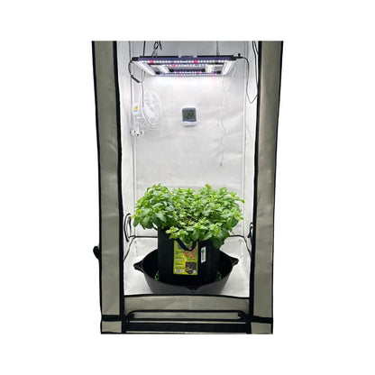 LUMATEK ATS PRO LED grow light installed in Homebox Q80+ grow tent above healthy plants for hydroponic cultivation.