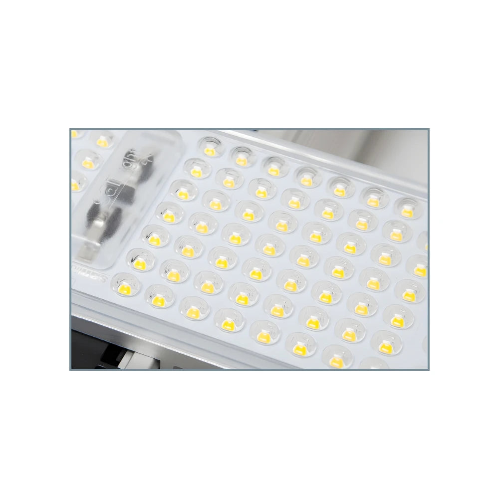 Close-up of SANlight LED light panel with visible LEDs on a white background