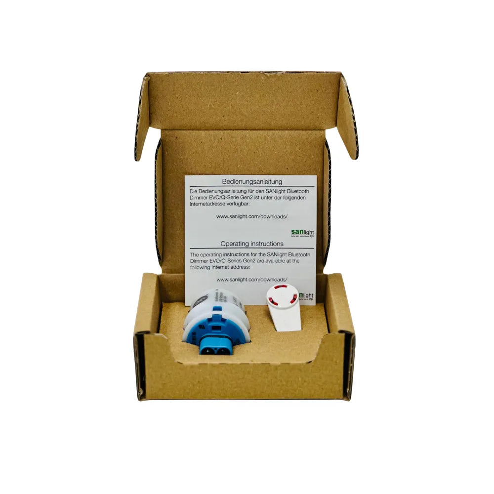 Cardboard box with SANlight Bluetooth dimmer and operating instructions on a white background