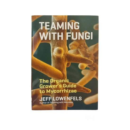 Cover of Teaming with Fungi by Jeff Lowenfels, an organic gardening guide explaining mycorrhizae, beneficial fungi and soil biology for healthier plant growth and improved cultivation.