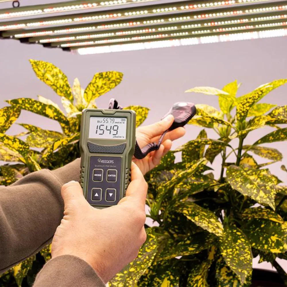 Treegers Quantum PAR meter measuring PPFD light levels under LED grow lights for accurate indoor plant lighting